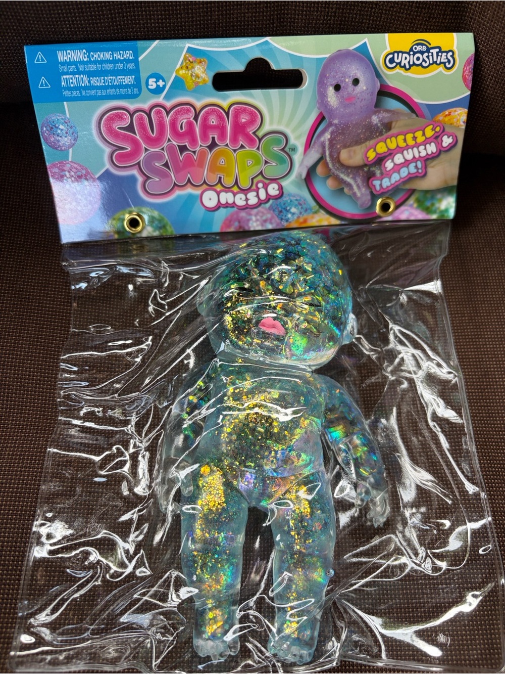 Sugar Swaps Onesie Glitter Squishy Figure - Iridescent Blue/Gold